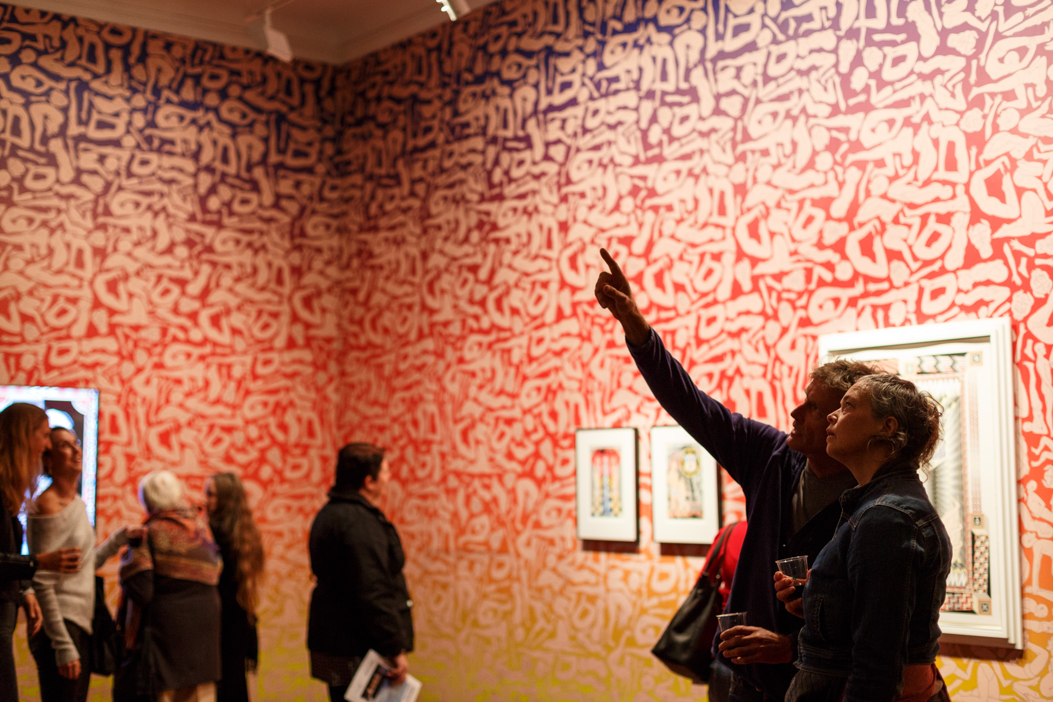 Jess Johnson’s Hex Nemesis exhibition sees FAC’s gallery covered with wallpaper featuring fleshy figures in various poses of supplication. Embedded amongst this installation is a series of her drawings that showcase her signature mind-bending reality, filled with impossible architecture and humanoid figures. The gallery also features a geometric installation built directly onto the fireplace with one of Johnson’s designs sitting above it.