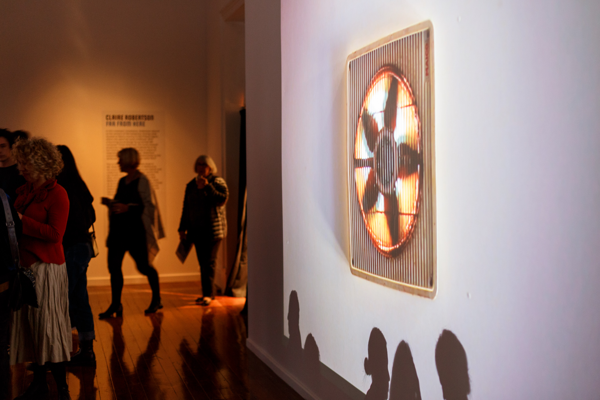 Melbourne-based artist Claire Robertson’s cinematic installation depicts an uninhabited temporary mining camp in the Pilbara, showing scenes of empty industrial villages set against the Australian outback. The installation is accompanied by a haunting original soundtrack by composer Tilman Robinson.