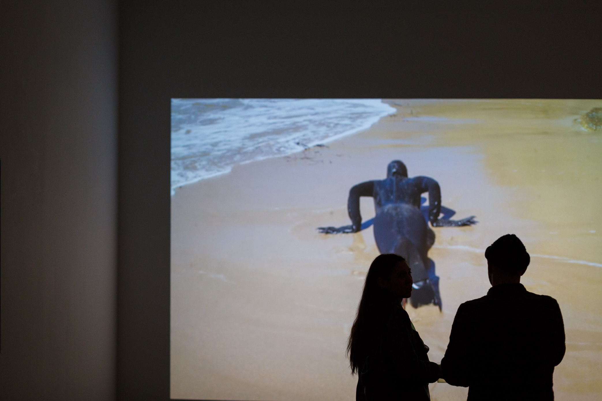 Warp features eight individual video works presented across various-sized screens including projections, television screens and phone screens. Each work is a unique look at the way the internet and screen-based technology permeates our lives.