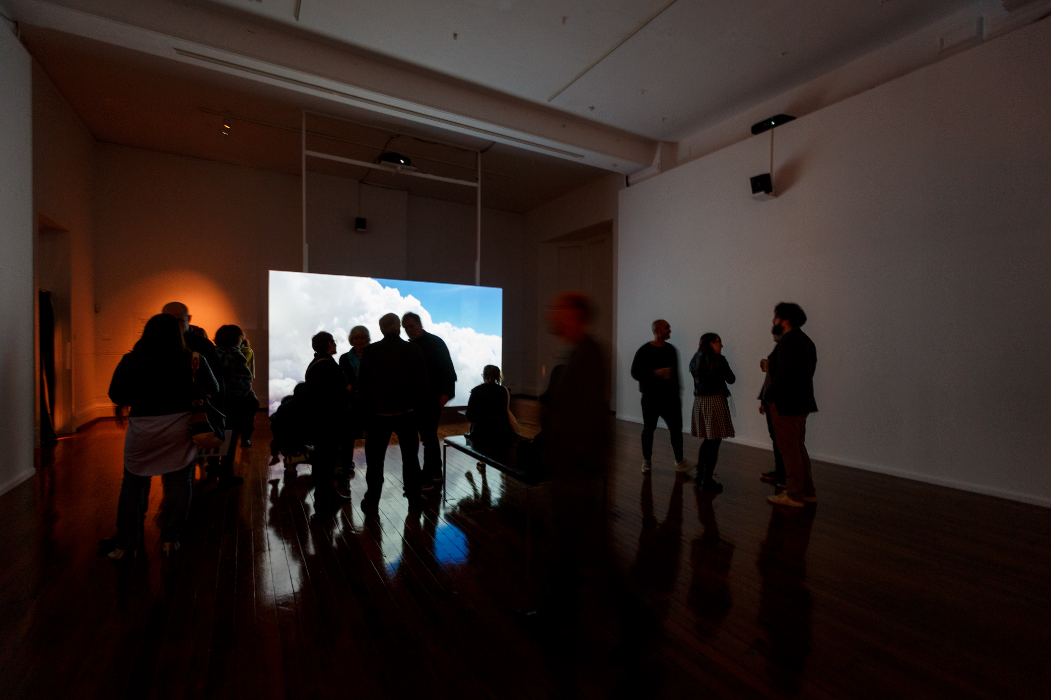 Melbourne-based artist Claire Robertson’s cinematic installation depicts an uninhabited temporary mining camp in the Pilbara, showing scenes of empty industrial villages set against the Australian outback. The installation is accompanied by a haunting original soundtrack by composer Tilman Robinson.