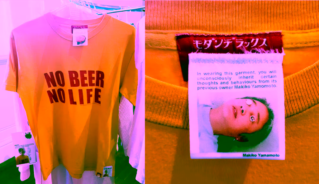 Yellow t-shirt with red text "NO BEER NO LIFE" and a label featuring a portrait and text about Makiko Yamamoto.
